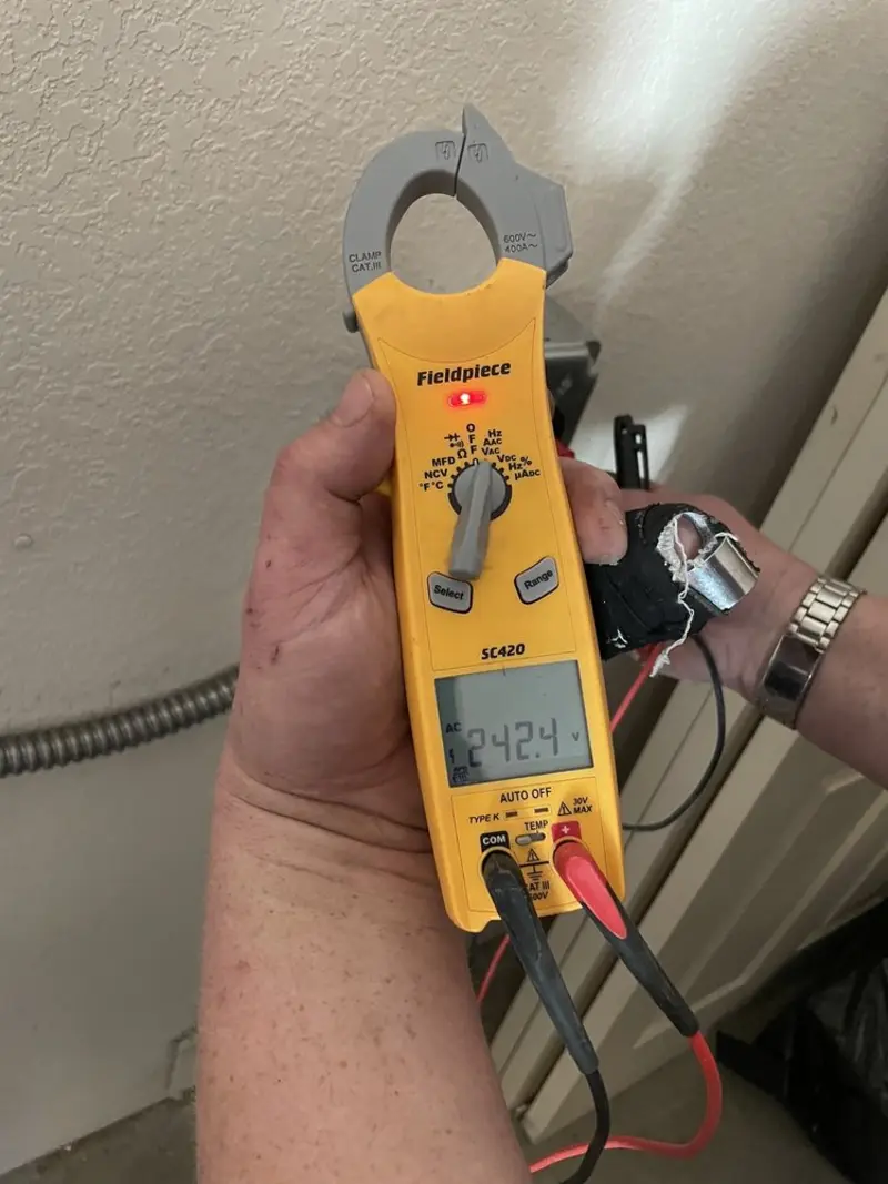 Voltage testing with clamp meter during Electrical Installation Services in Haddonfield